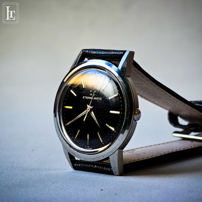 Eterna Matic black gilt dress