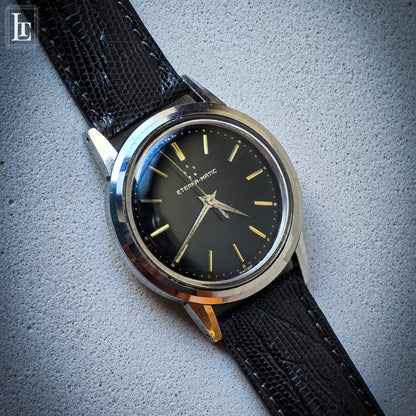 Eterna Matic black gilt dress