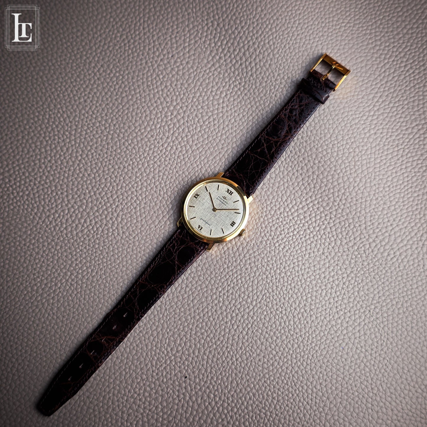 Movado Gentleman Automatic 18k linen