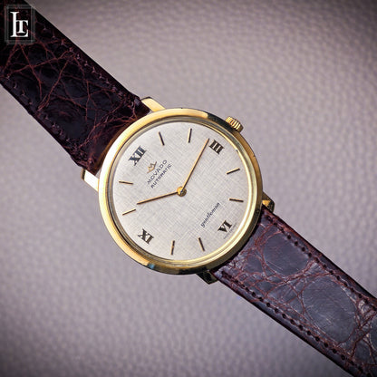 Movado Gentleman Automatic 18k linen