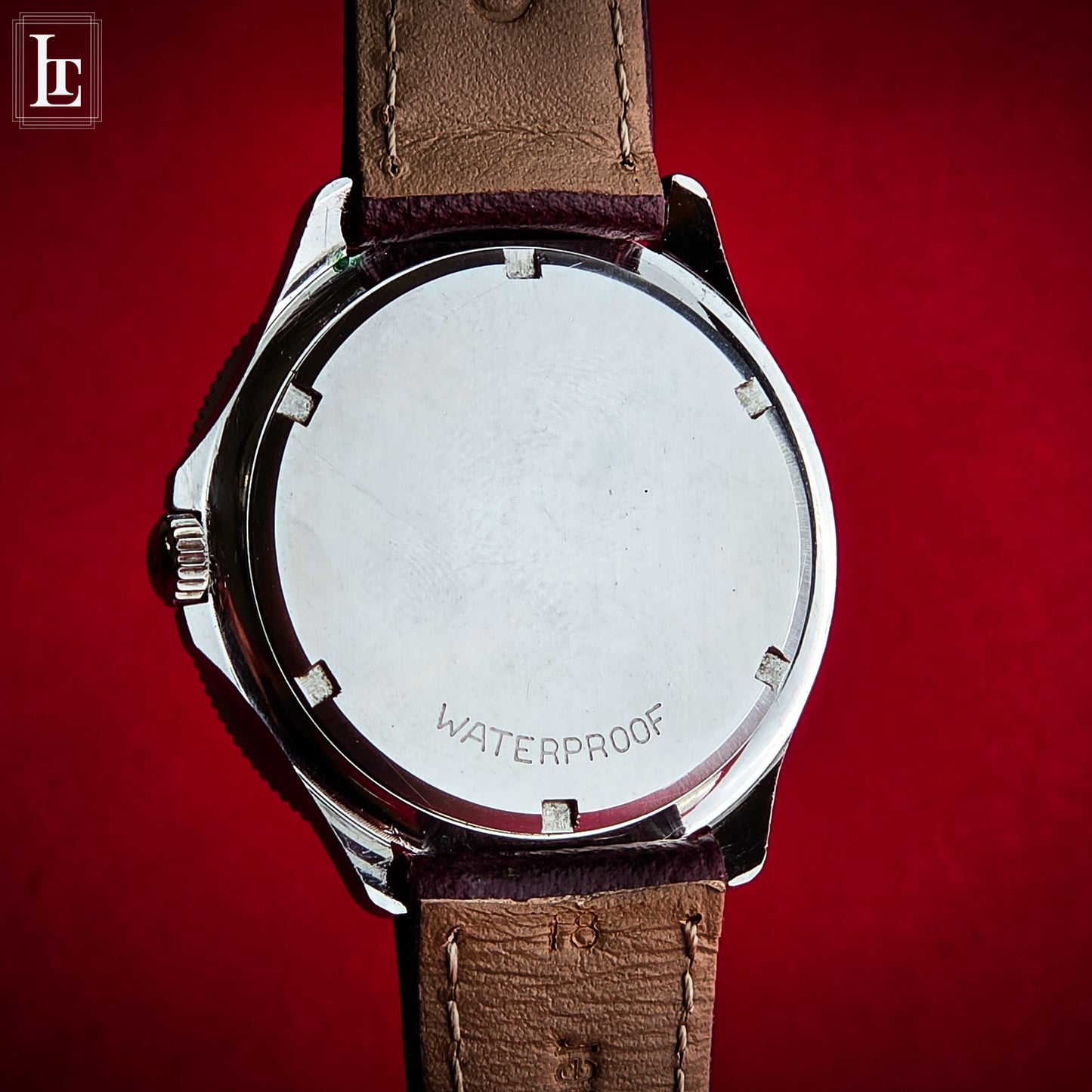 Omega Genève "Ancoretta" Ref. 135.042 Burgundy