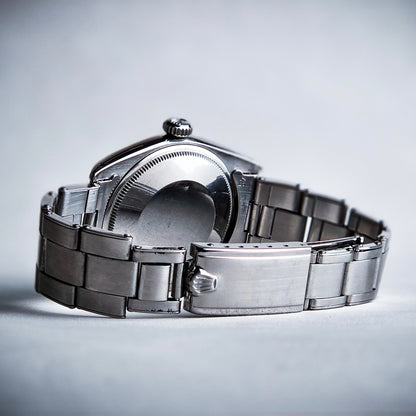 Rolex Date 1500 riveted
