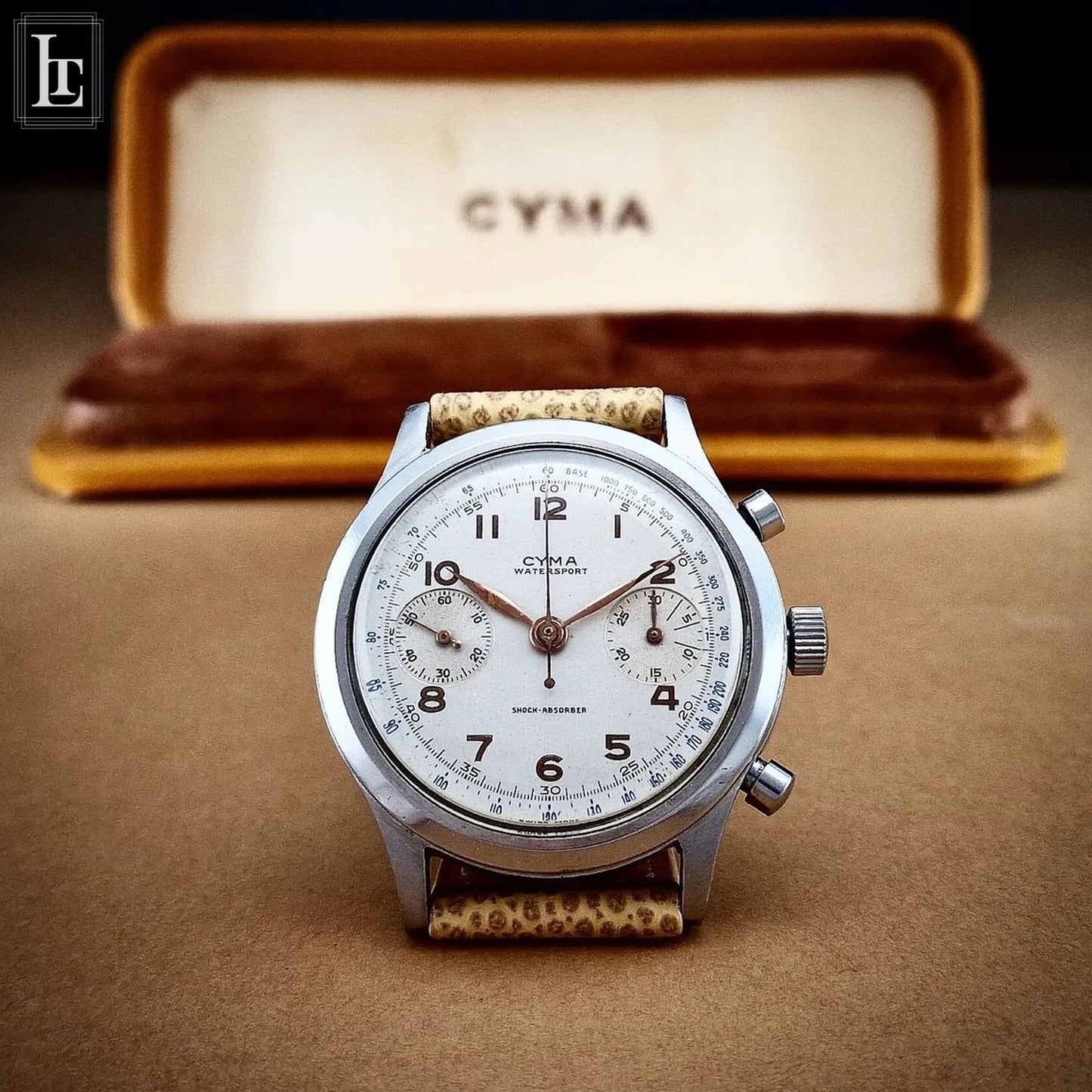 Cyma chronograph clamshell