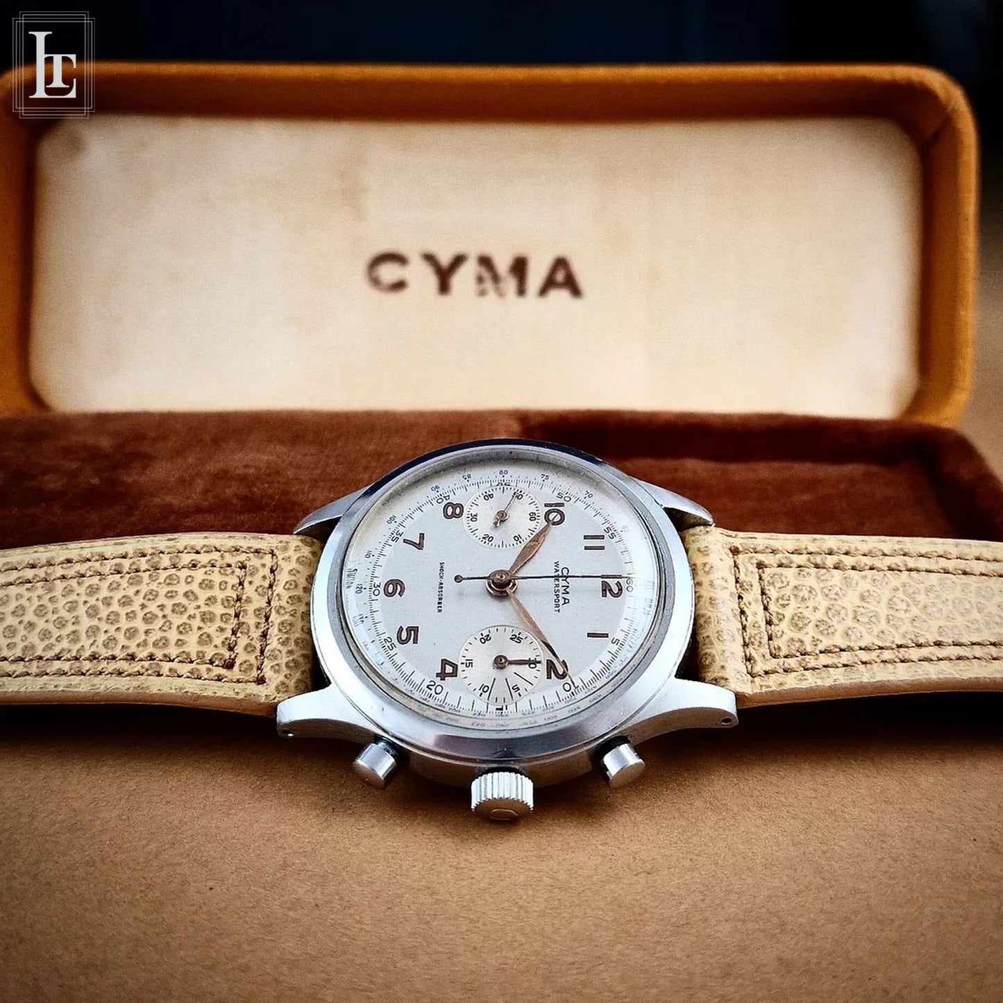 Cyma chronograph clamshell