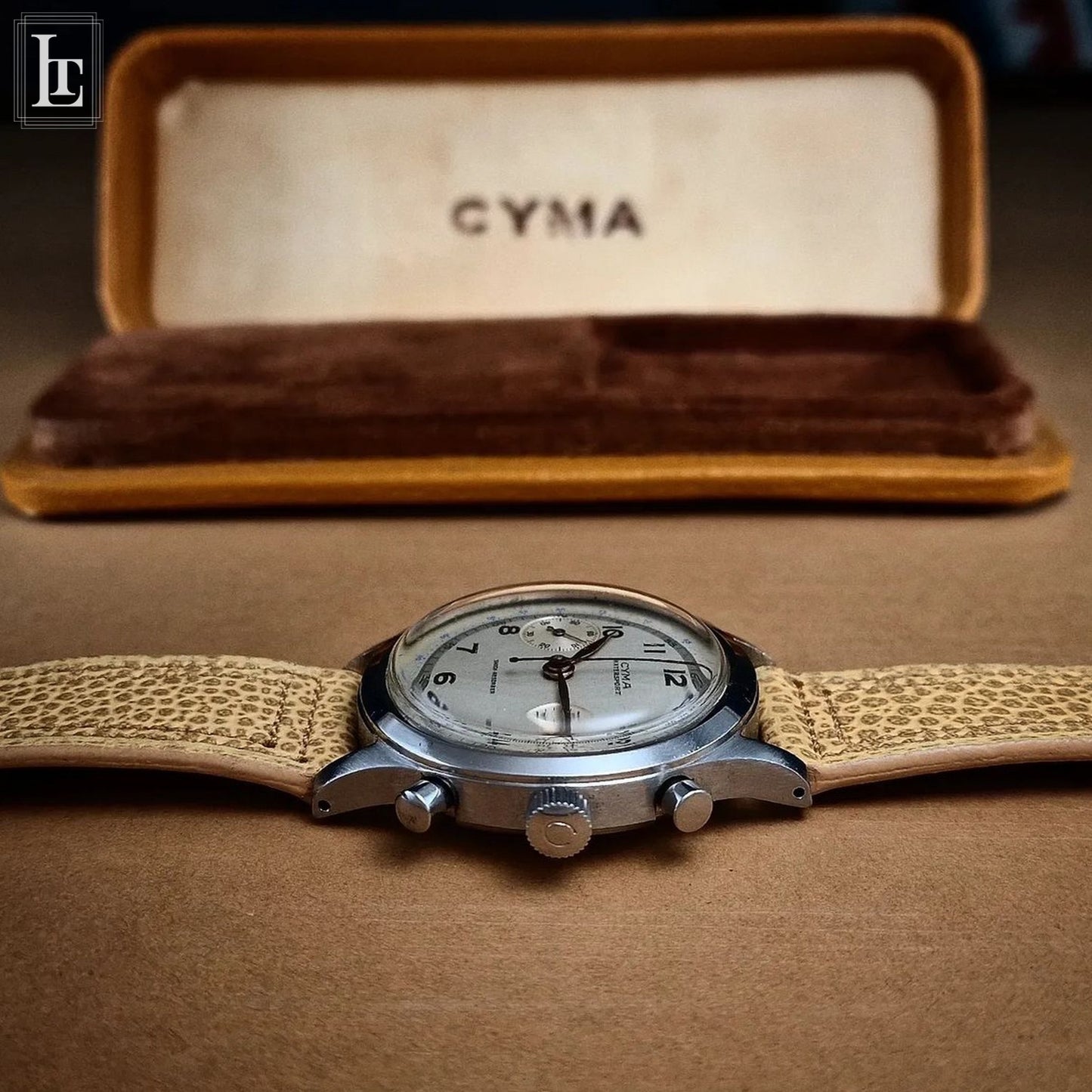 Cyma chronograph clamshell