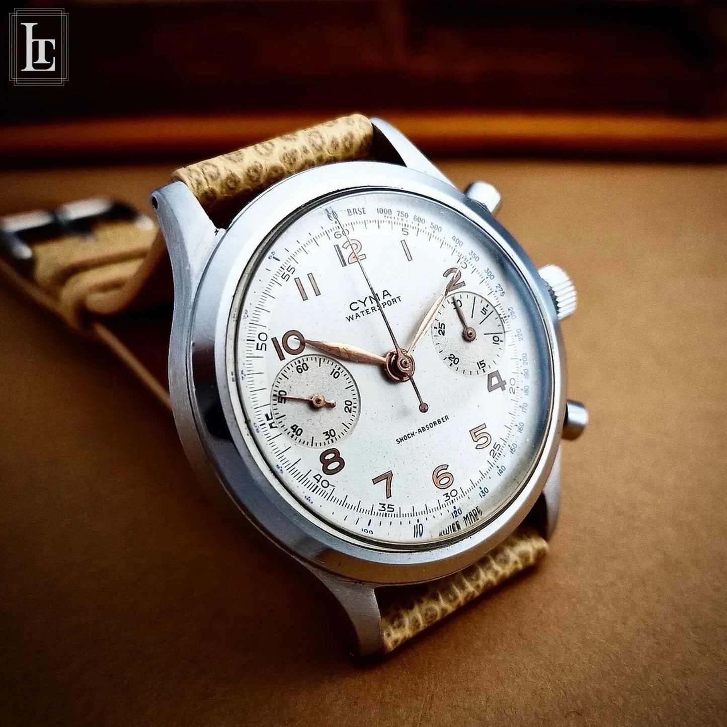 Cyma chronograph clamshell